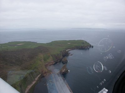 Cleared the snow squall and approaching John O’Groats, just right of centre is a Minimax.